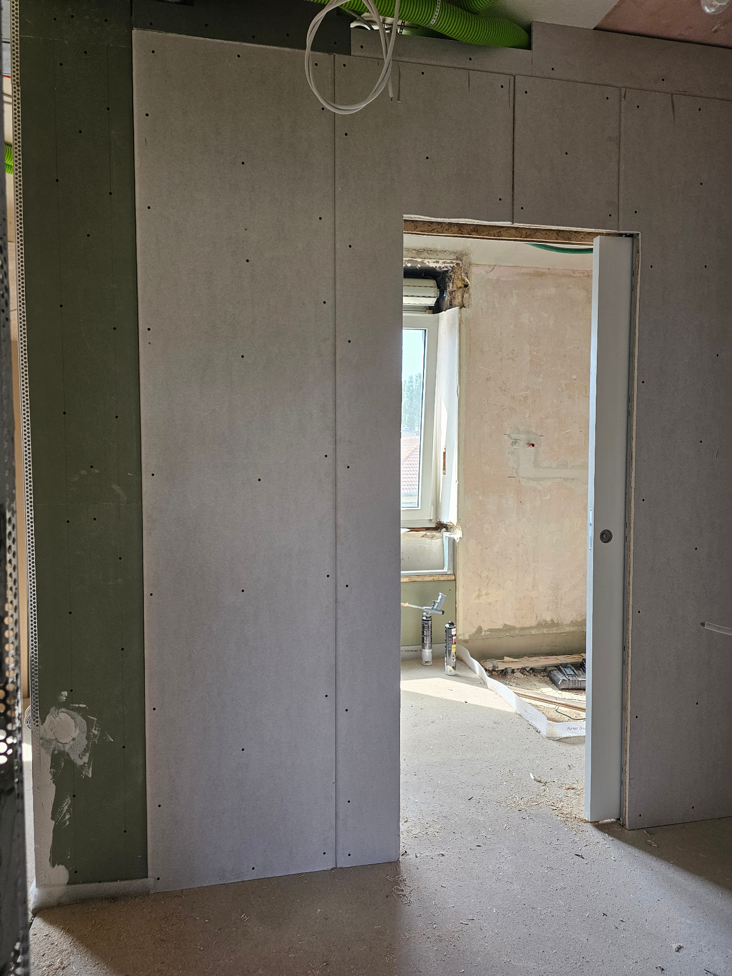 Drywall walls with hidden door & concealed electrics — after